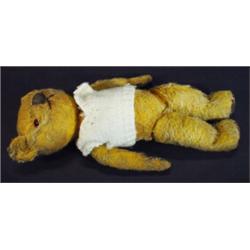 Old straw filled jointed teddy bear, 34cm high…