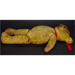 Large straw filled teddy bear with jointed arms and legs and squeaker, 75cm high…