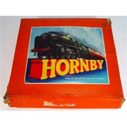 Boxed Hornby clockwork '0' gauge trainset with British Railways engine, three locomotives and tra…