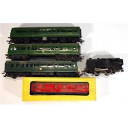 00 Gauge locomotive, three British Railways carriages and a boxed 00 gauge carriage…