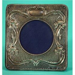 Square silver Art Nouveau photo frame, moulded with stylised flowers, Birmingham 1903, 10cm diame…