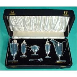 Boxed five piece silver cruet set, comprising salt, pepper, mustard and spoon, sugar sifter and c…