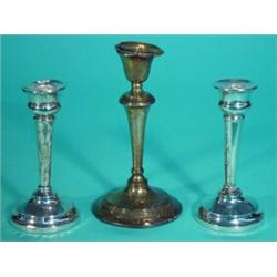 Pair of circular based silver candlesticks and one other, largest 19cm high…