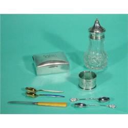 Box of assorted silver items including rectangular box, cut glass silver topped sugar sifter, nap…