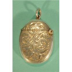 Oval silver vesta, chased with swags, Chester, 1901…