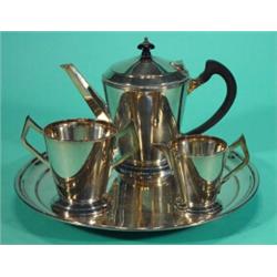 Three piece silver plated teaset with ebony knop and handle on circular tray…