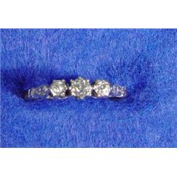 18ct and platinum three stone diamond gypsy ring…