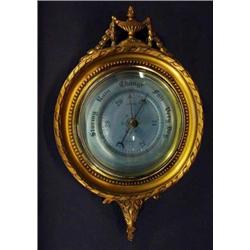 Circular gilt Smiths barometer with classical mouldings, 35cm high…