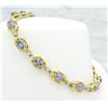 Image 1 : 2.40ctw Tanzanite and Diamond Bracelet - 14KT Yellow Gold