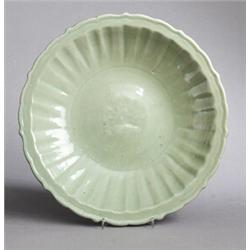 A MING CELADON STONEWARE DISH, 15th century,, A MING CELADON STONEWARE DISH, 15th century, diam...