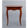 Image 1 : A rococo elmwood TABLE À ÉCRIRE, brass, A rococo elmwood TABLE À ÉCRIRE, brass escutcheon, frie...