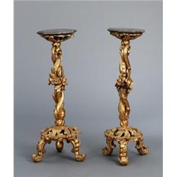 A pair of baroque cut and gilt hardwood, A pair of baroque cut and gilt hardwood GUERIDONS, mar...