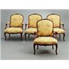 Image 1 : A set of four Louis XV polished red beech, A set of four Louis XV polished red beech ARMCHAIRS,...