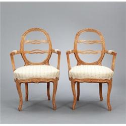 A pair of Swedish rococo cut and polished, A pair of Swedish rococo cut and polished hardwood A...