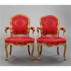 A pair of Swedish rococo giltwood ARMCHAIRS,, A pair of Swedish rococo giltwood ARMCHAIRS, Stoc...