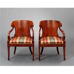 A pair of Russian empire mahogany ARMCHAIRS;, A pair of Russian empire mahogany ARMCHAIRS; mino...