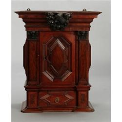 A German baroque walnut CABINET, cut decoration,, A German baroque walnut CABINET, cut decorati...