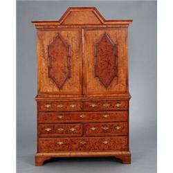 A late baroque gilt mounted burr alder CABINET,, A late baroque gilt mounted burr alder CABINET...