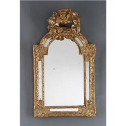 A Central European régence giltwood MIRROR,, A Central European régence giltwood MIRROR, pierce...