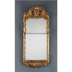 A Swedish rococo giltwood MIRROR, Stockholm, 114, A Swedish rococo giltwood MIRROR, Stockholm,...