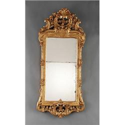 A Swedish rococo cut giltwood MIRROR, Stockholm,, A Swedish rococo cut giltwood MIRROR, Stockho...