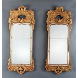 A pair of similar rococo giltwood MIRRORS,, A pair of similar rococo giltwood MIRRORS, Stockhol...