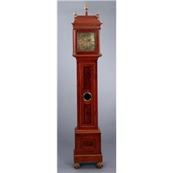 A baroque walnut LONGCASE CLOCK, brass dial, A baroque walnut LONGCASE CLOCK, brass dial signed...