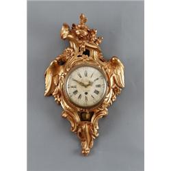 A Swedish rococo gilt and bronzed wood CARTEL, A Swedish rococo gilt and bronzed wood CARTEL CL...