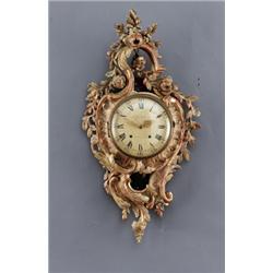 A Swedish rococo gilt and bronzed wood CARTEL, A Swedish rococo gilt and bronzed wood CARTEL CL...