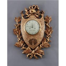 A Swedish empire giltwood CARTEL CLOCK,, A Swedish empire giltwood CARTEL CLOCK, Stockholm, dia...