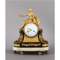 A French Louis XVI ormolu and patinated bronze, A French Louis XVI ormolu and patinated bronze...