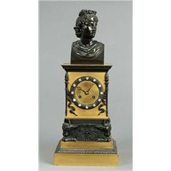 An empire gilt and patinated bronze MANTEL CLOCK,, An empire gilt and patinated bronze MANTEL C...