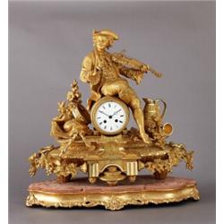 A French Louis XVI-style gilt metal MANTEL CLOCK,, A French Louis XVI-style gilt metal MANTEL C...