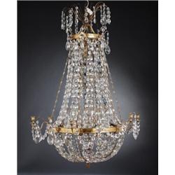 A Louis XVI six-light CHANDELIER, partly gilt, A Louis XVI six-light CHANDELIER, partly gilt br...