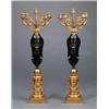 Image 1 : A pair of empire-style gilt and patinated bronze, A pair of empire-style gilt and patinated bro...
