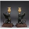 Image 1 : A pair of empire partly gilt and blackened bronze, A pair of empire partly gilt and blackened b...