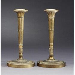 A pair of French late empire partly gilt bronze, A pair of French late empire partly gilt bronz...
