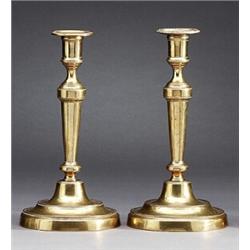 A pair of Louis XVI brass CANDLESTICKS, 27 cm, A pair of Louis XVI brass CANDLESTICKS, 27 cm hi...