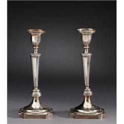 A pair of Russian empire silver-plated, A pair of Russian empire silver-plated CANDLESTICKS, st...