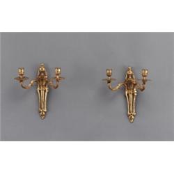 A pair of Louis XVI gilt bronze two-light BRAS DE, A pair of Louis XVI gilt bronze two-light BR...