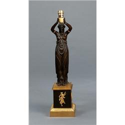 An empire gilt and patinated bronze TABLE LAMP,, An empire gilt and patinated bronze TABLE LAMP...