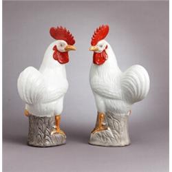 A PAIR OF ROASTERS, in white and red glaze,, A PAIR OF ROASTERS, in white and red glaze, porcel...