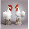 Image 1 : A PAIR OF ROASTERS, in white and red glaze,, A PAIR OF ROASTERS, in white and red glaze, porcel...