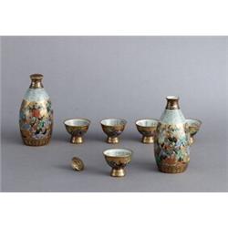 A SET OF 20th CENTURY SATSUMAPORCELAIN BOTTLES, A SET OF 20th CENTURY SATSUMAPORCELAIN BOTTLES...