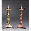 A set of two similar baroque brass CANDLESTICKS,, A set of two similar baroque brass CANDLESTIC...