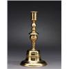 A baroque brass CANDLESTICK, 33 cm high; foot, A baroque brass CANDLESTICK, 33 cm high; foot wi...
