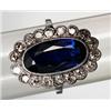 A platina RING, stamped 1936, 1 synthetic, A platina RING, stamped 1936, 1 synthetic sapphire a...