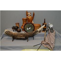 Selection of Indonesian collectibles including treenware animals, figures and vase, puppet and large