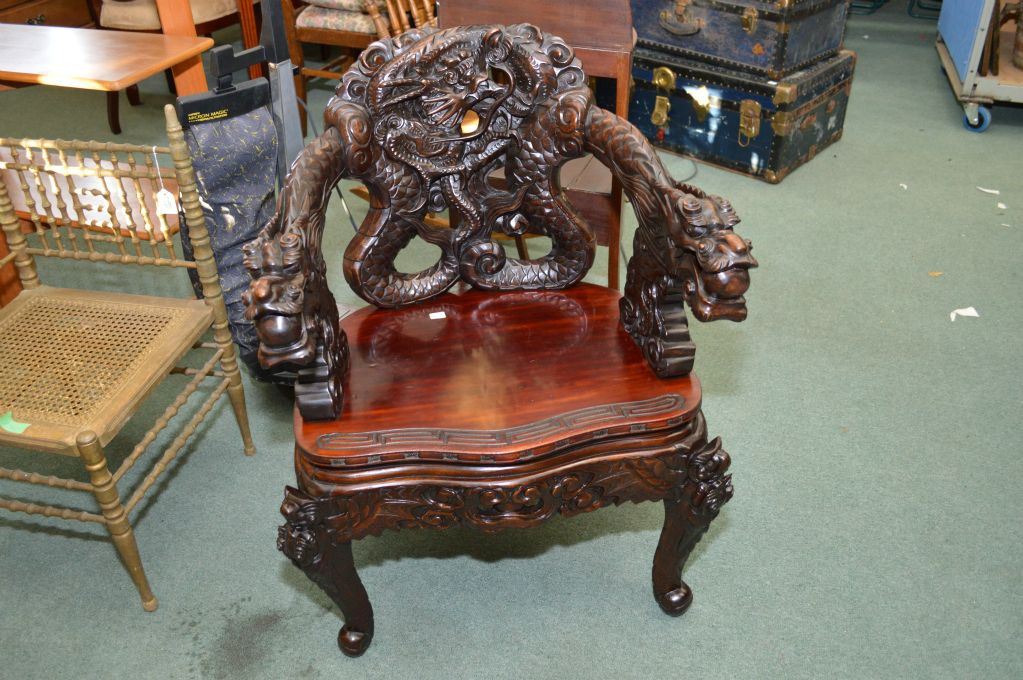 Download Oriental heavily carved dragon motif rosewood chair