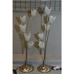 A pair of modern five branch table lamps with frosted tulip motif shades